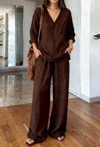 Detail shot of the breathable brown linen fabric texture on a two-piece casual women's set