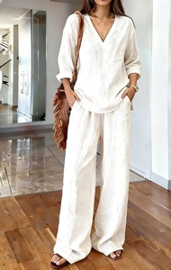 Detailed texture of white linen V-neck top and wide-leg trousers casual two-piece set