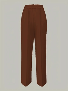 Detail of high waist brown wide-leg trousers with elastic waistband and center pleat