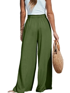 Vista posteriore dei pantaloni larghi a vita alta in cotone e lino verde scuro elastici