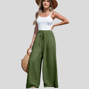Pantaloni larghi da donna in cotone e lino verde con vita alta e coulisse per l'estate