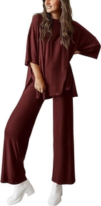 Deep burgundy two-piece lounge set with oversized crewneck top and wide-leg trousers