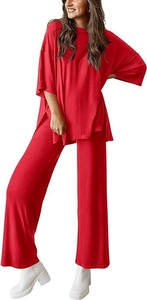 Detail view of the loose red crew neck t-shirt with side slit and wide leg pants set