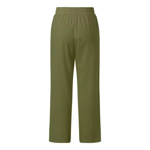 Detailed texture of olive green linen trousers showing elastic waist and fabric grain
