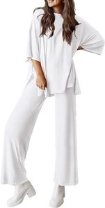 Detail view of white loungewear set featuring side slit top and high waist wide leg pants