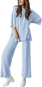 Detail of light blue oversized lounge set with side slit top and high-waisted wide-leg pants