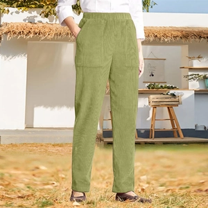 Detailed view of olive green corduroy pants with elastic high waist and front patch pockets