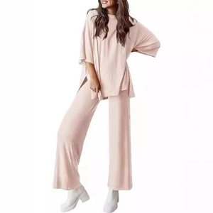 Women's casual two-piece lounge set with short sleeve top and high waist pants in pale pink
