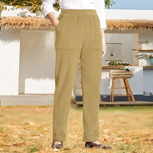Detail of khaki corduroy pants showing elastic high waist and large front pockets