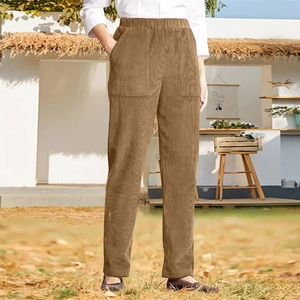 Detail view of brown corduroy trousers featuring straight leg cut and square patch pockets