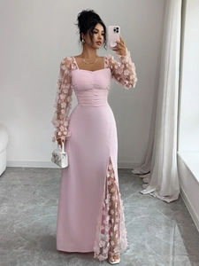 Close-up of pink lace dress with floral mesh sleeves, square neck and pleated bodice details