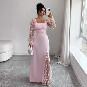 Elegant light pink lace maxi dress with long floral mesh sleeves and a side slit