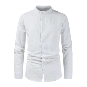 Close-up of white linen shirt showing mandarin collar and textured fabric detail