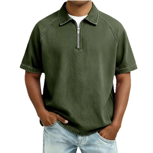 Men's olive green quarter-zip polo shirt with waffle texture and raglan sleeves