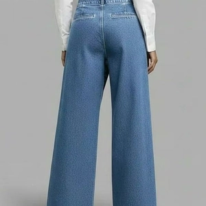 Women's high waist wide leg denim trousers in medium blue with classic back pockets