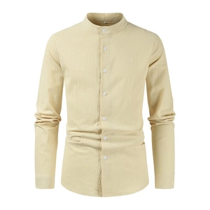 Detail of light beige men's long sleeve shirt showing cotton linen fabric and stand collar