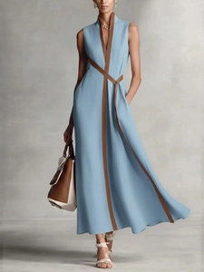 Elegant light blue cotton linen sleeveless A-line maxi dress with brown contrast trim
