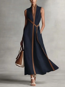 Elegant navy blue sleeveless cotton linen maxi dress with brown contrast trim and V-neckline