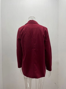 Rear view of a burgundy long-sleeve blazer showing the tailored back seam and collar