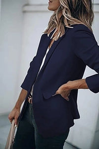 Side view of dark blue women's blazer with lapel collar and symmetric side pockets