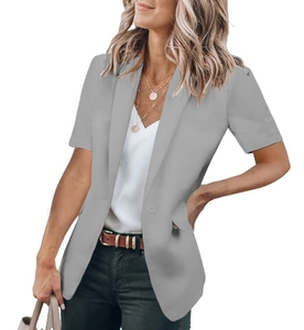 Detail view of grey short sleeve blazer with notch lapel and single-button closure