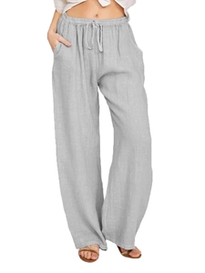 Detail of light gray cotton linen wide-leg pants with elastic drawstring waist and pockets
