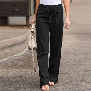 Detail of black cotton linen wide-leg pants with elastic drawstring waist and loose fit