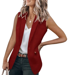 Detail of burgundy sleeveless blazer vest featuring a classic lapel and single button