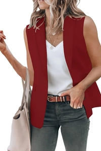 Detail view of burgundy sleeveless blazer vest styled with a leather belt and handbag