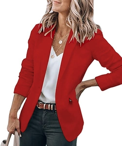 Close-up of vibrant red notched lapel suit jacket with premium stitching and button details