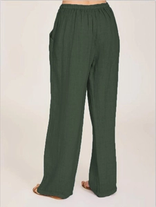 Back view of loose-fit dark green cotton linen trousers with high elastic waist design