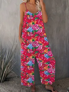 Close-up of vibrant red floral and phoenix pattern on wide-leg summer jumpsuit