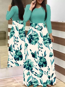Vues avant et arrière d'une robe élégante à manches longues vert menthe et jupe à fleurs