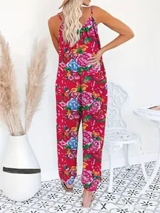 Detailed back view of sleeveless floral jumpsuit showing vibrant red floral print patterns