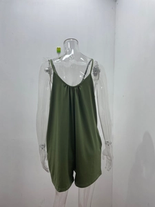 Detail of olive green V-neck romper with thin straps and ruffled neckline texture