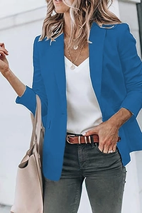 Detail of royal blue blazer with notched lapels and single-breasted urban workwear style