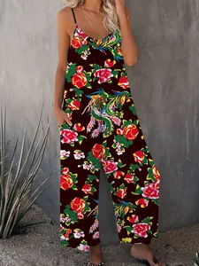 Detail view of coffee-colored wide-leg jumpsuit with vibrant floral and phoenix patterns