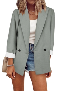 Detailed sage green blazer with double-breasted buttons and white folded cuffs