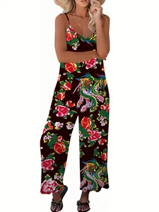 Detail view of loose summer jumpsuit with retro floral and phoenix print patterns