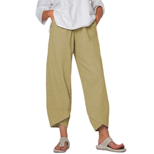 Detailed view of women cotton linen wide leg pants featuring unique layered crossover split hem