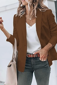 Detail of a dark brown single-breasted blazer for women with classic lapels and a casual fit