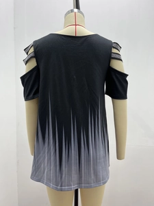 Cold shoulder detail of grey gradient top with rhinestone straps and zigzag print pattern