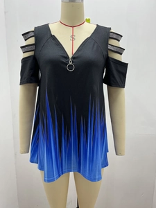 Detail of cold-shoulder V-neck top with rhinestone straps and blue gradient print