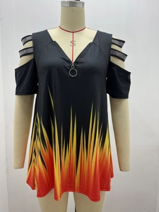 Detail of V-neck zipper top with flame print and cold shoulder rhinestone straps