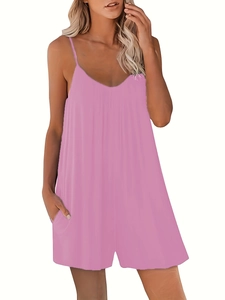 Detailed view of pink V-neck loose romper with thin straps and side pockets