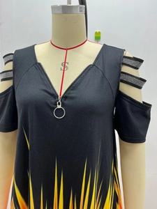 Detail of V-neck zipper with silver rhinestone cutout shoulder and flame print on top