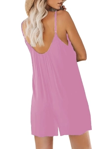 Back view of summer V-neck spaghetti strap romper in pink showing low U-shaped open back cut