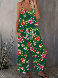 Detail of V-neck printed jumpsuit with floral and peacock feather motifs and side pockets