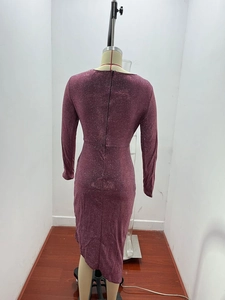Detail of the glittering wine red fabric texture and back zipper on this cocktail dress