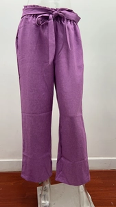 Detail of high waisted purple cotton linen trousers with a ruffle waist and matching fabric tie